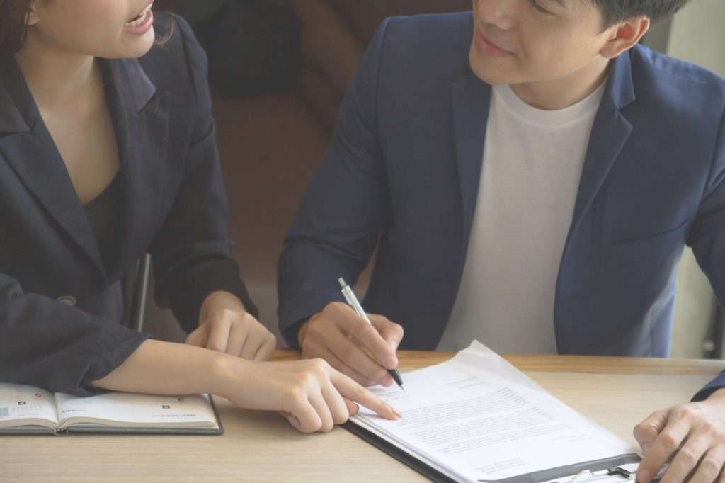 Professional Liability Insurance Florida businessman and businesswoman signing paper insurance contract important 1024x682 - Professional Liability Insurance Florida