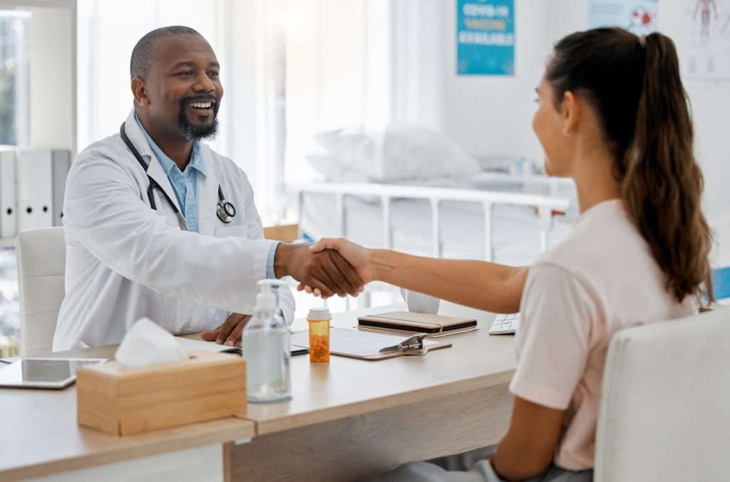 United Health Insurance healthcare insurance and handshake between a doctor and patient consulting in an office discussin 1024x676 - United Health Insurance