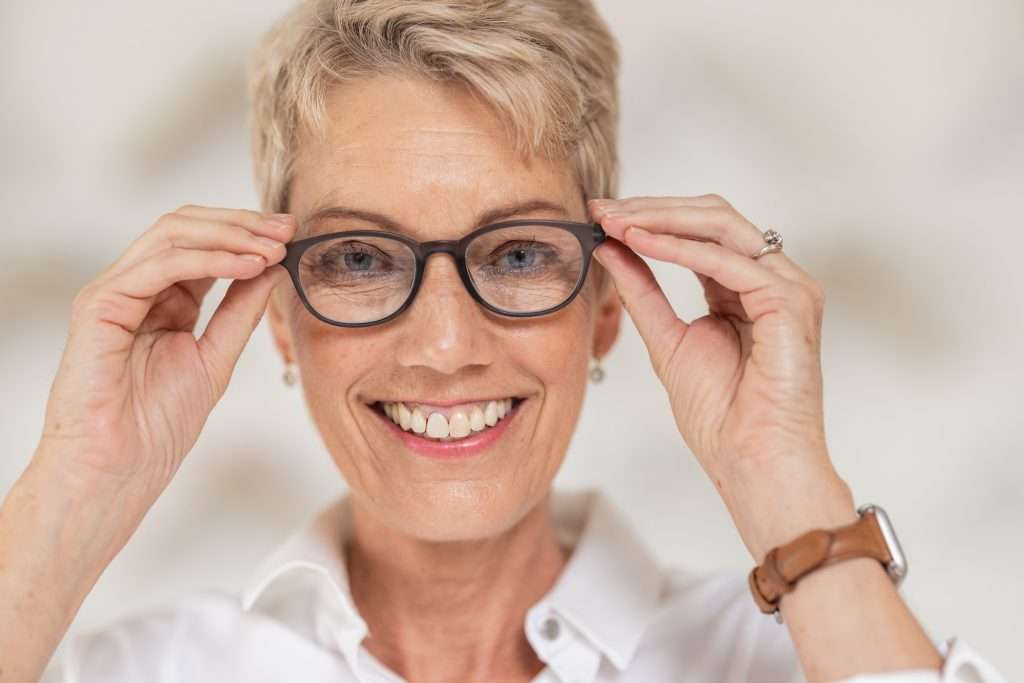 mature woman face and vision glasses in fashion or style eye care for healthcare insurance medica 1024x683 - What Insurance Does Walmart Vision Center Accept