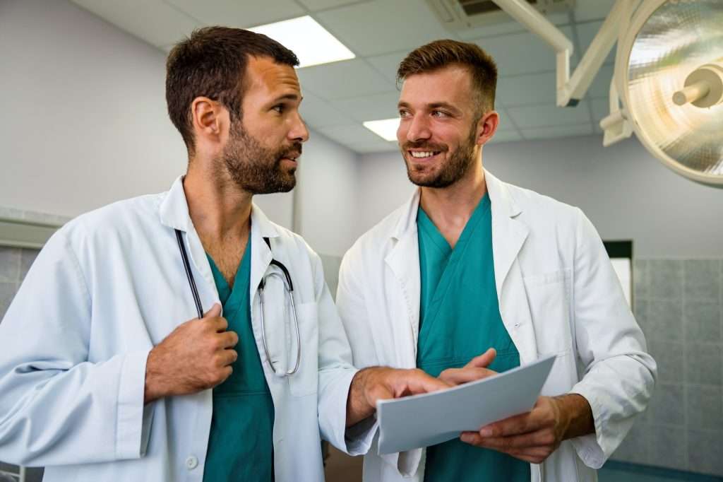 Affordable Health Insurance medical staff having discussion in hospital healthcare workers coronavirus and insurance concept 1024x682 - Affordable Health Insurance