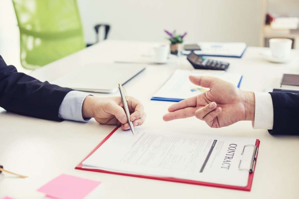 Public Liability Insurance signing the agreement in the contract document 1024x682 - Public Liability Insurance