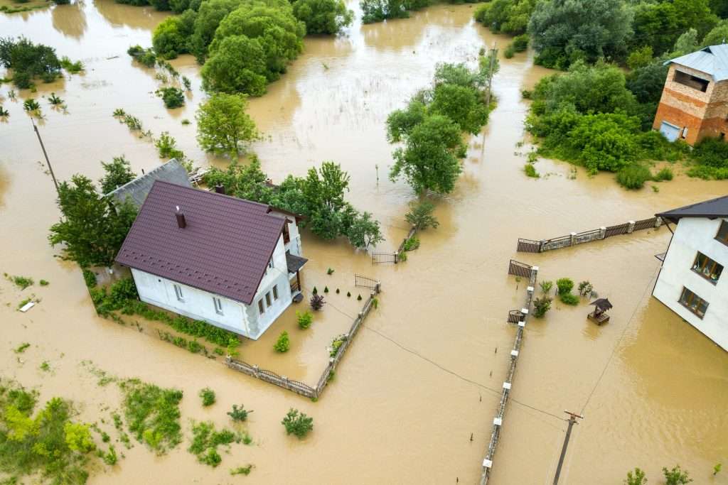 aerial view of flooded house with dirty water all around it  1024x683 - What Does Flood Insurance Cover In Florida